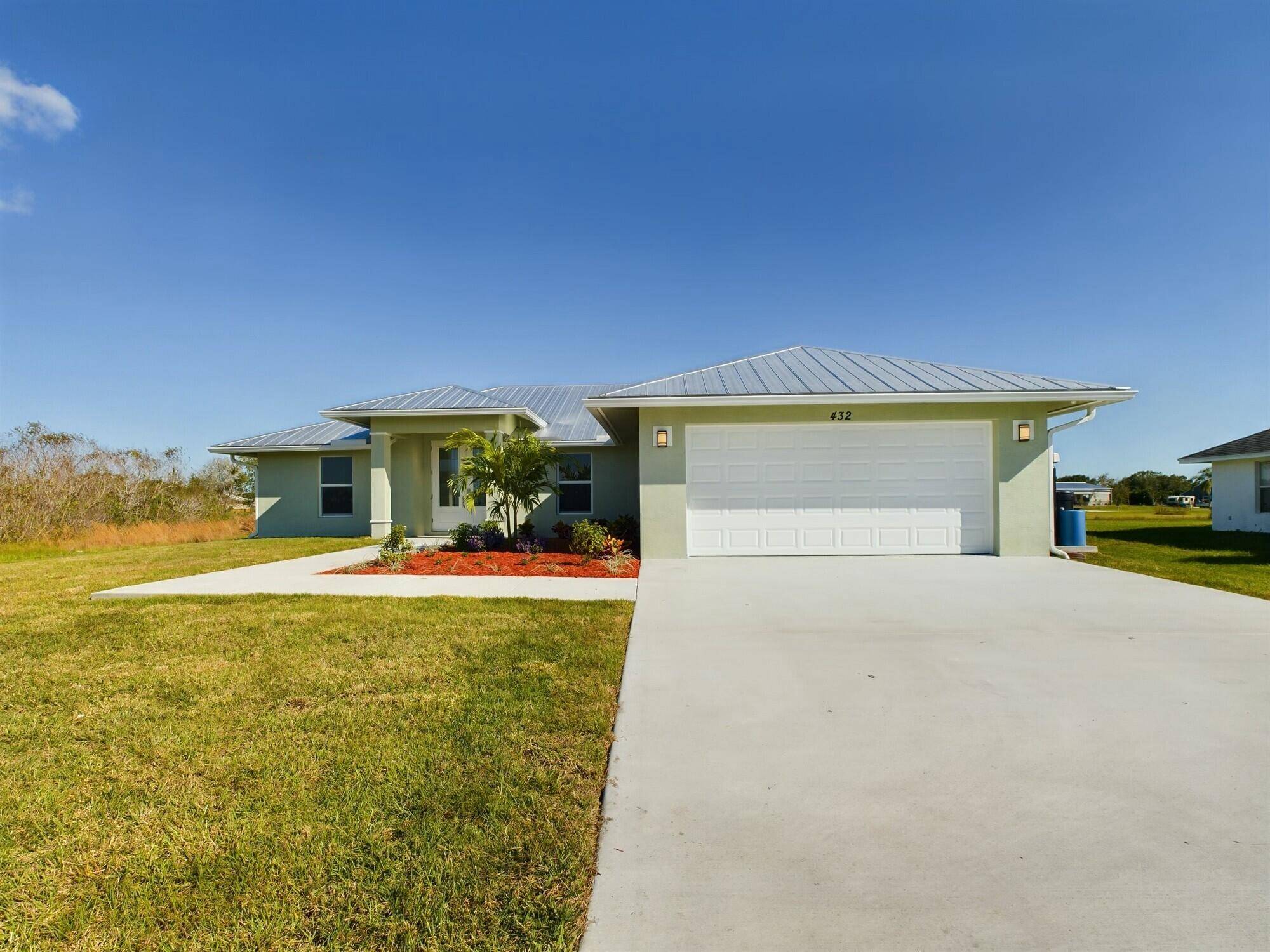Brand New Custom Built Home in Edgewater AcresDiscover this stunning, custom built 2024 home featuring 4 bedrooms, 2 bathrooms, and a 2 car garage, all situated on just over half ...