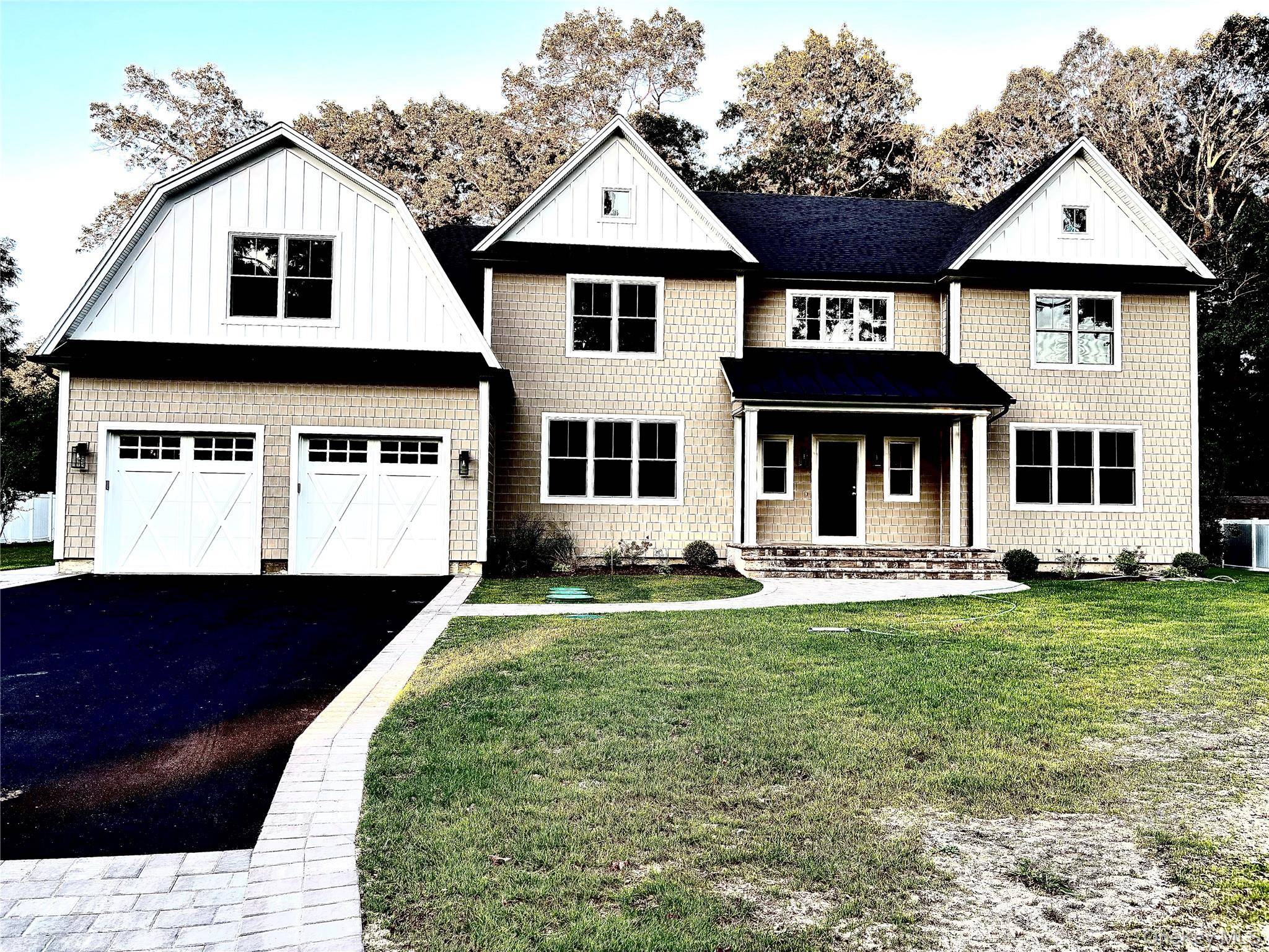 Welcome to this exquisite new Colonial style home, where timeless elegance meets modern comfort.