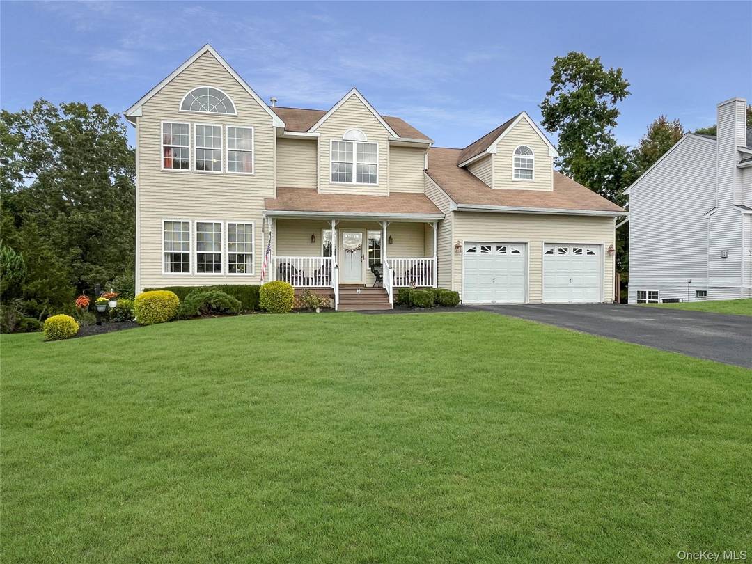 Welcome home to this elegant four bedroom colonial gracing a quiet cul de sac in the Streamside Knolls community.