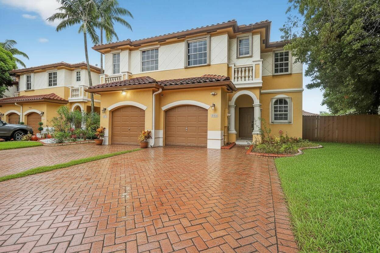 Nestled in the desirable gated community of Santorini at Vizcaya.