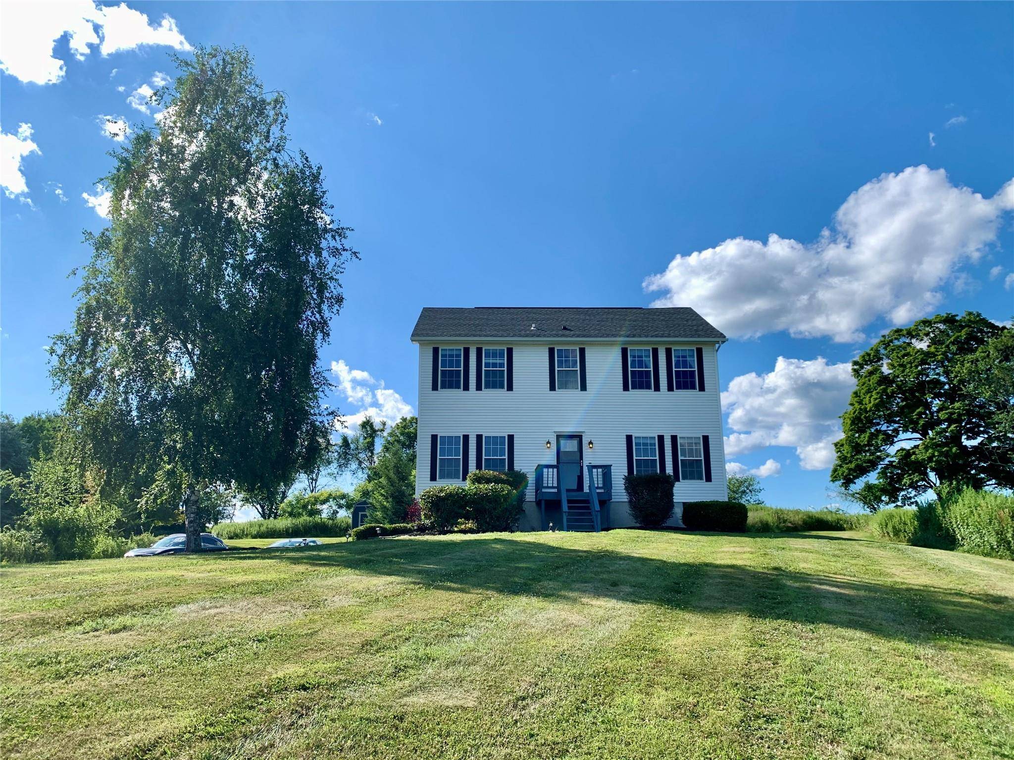 Beautiful colonial style home nestled at the end of a quiet cul de sac in Lagrangeville, offering stunning mountain views.