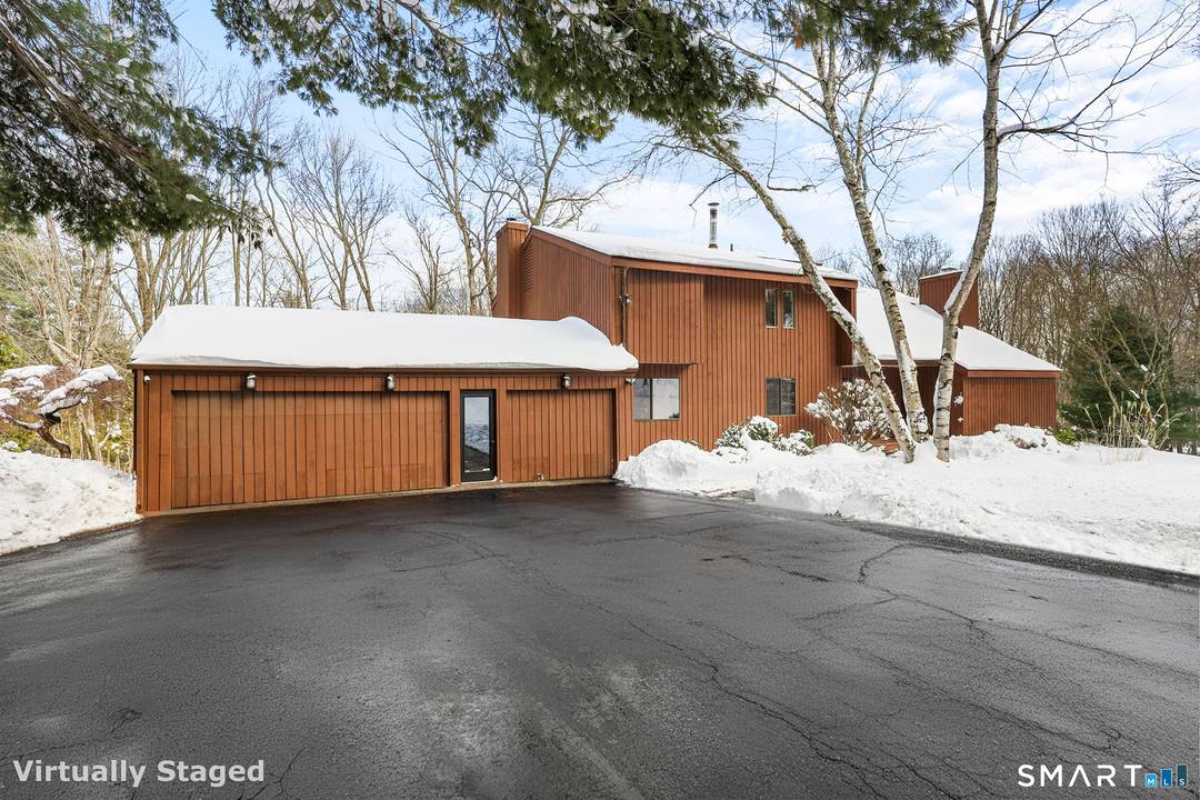 Welcome to 53 Rock Hill Road in Woodbridge privately set back from the end of the cul de sac, this stunning contemporary colonial exceeds expectations while radiating warmth and comfort.