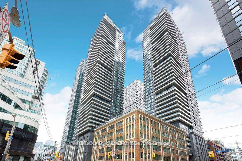 Bright high floor studio with unobstructed city views at luxury King Blue Condos in Toronto's Entertainment District.
