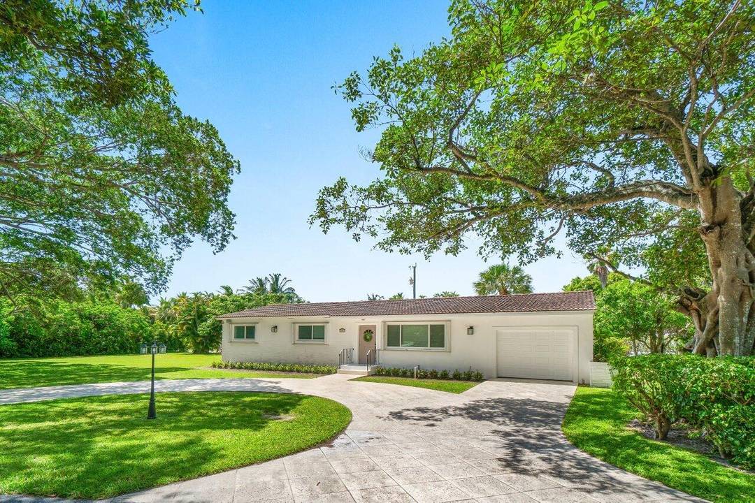 Hypoluxo Island 3 bedroom, 2 bath home with a 1 car garage, situated on a spacious lot.