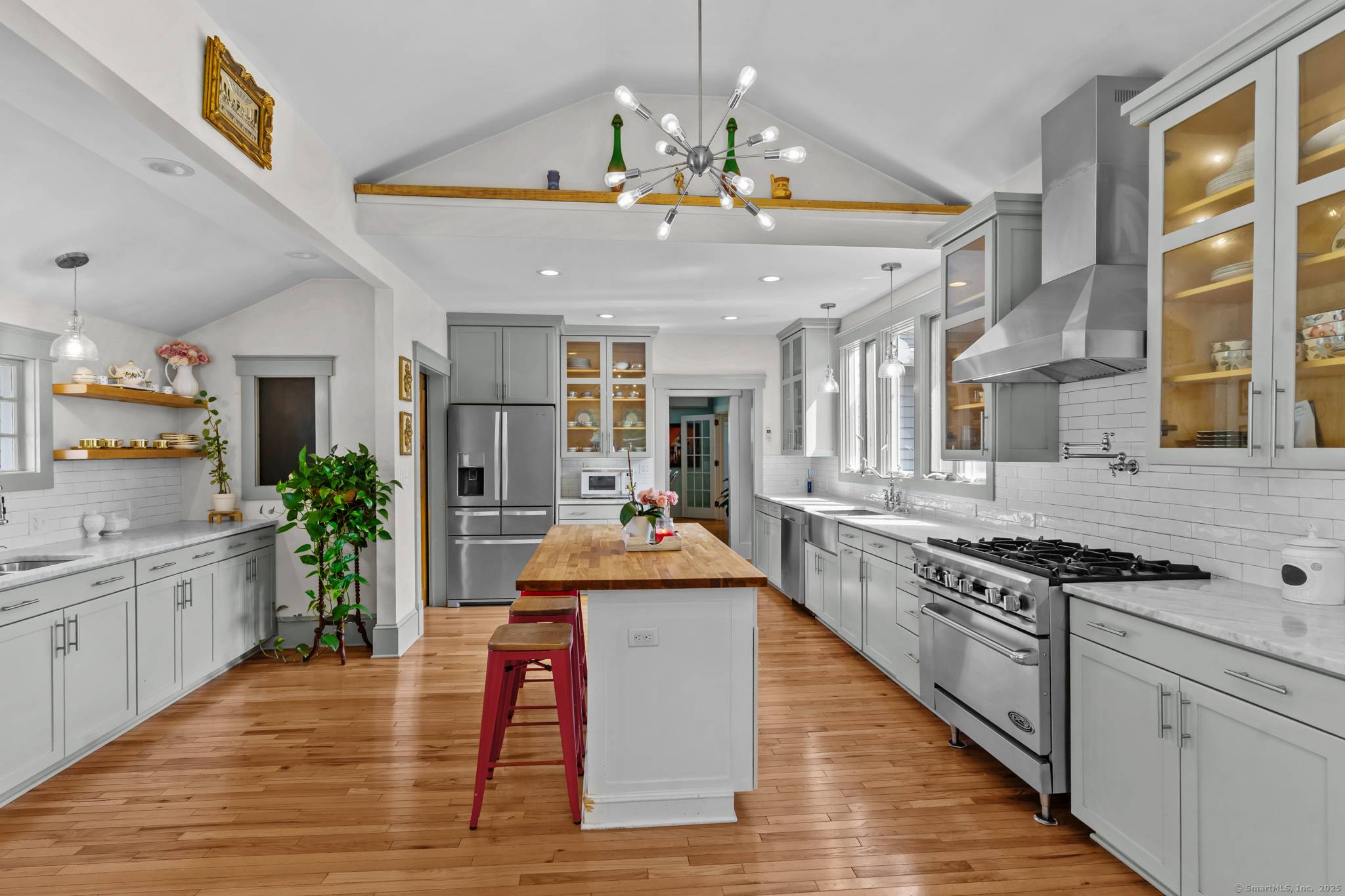 Welcome to this expansive Colonial style home offering 5 bedrooms and 5 full bathrooms, nestled on a picturesque 2 acre lot.