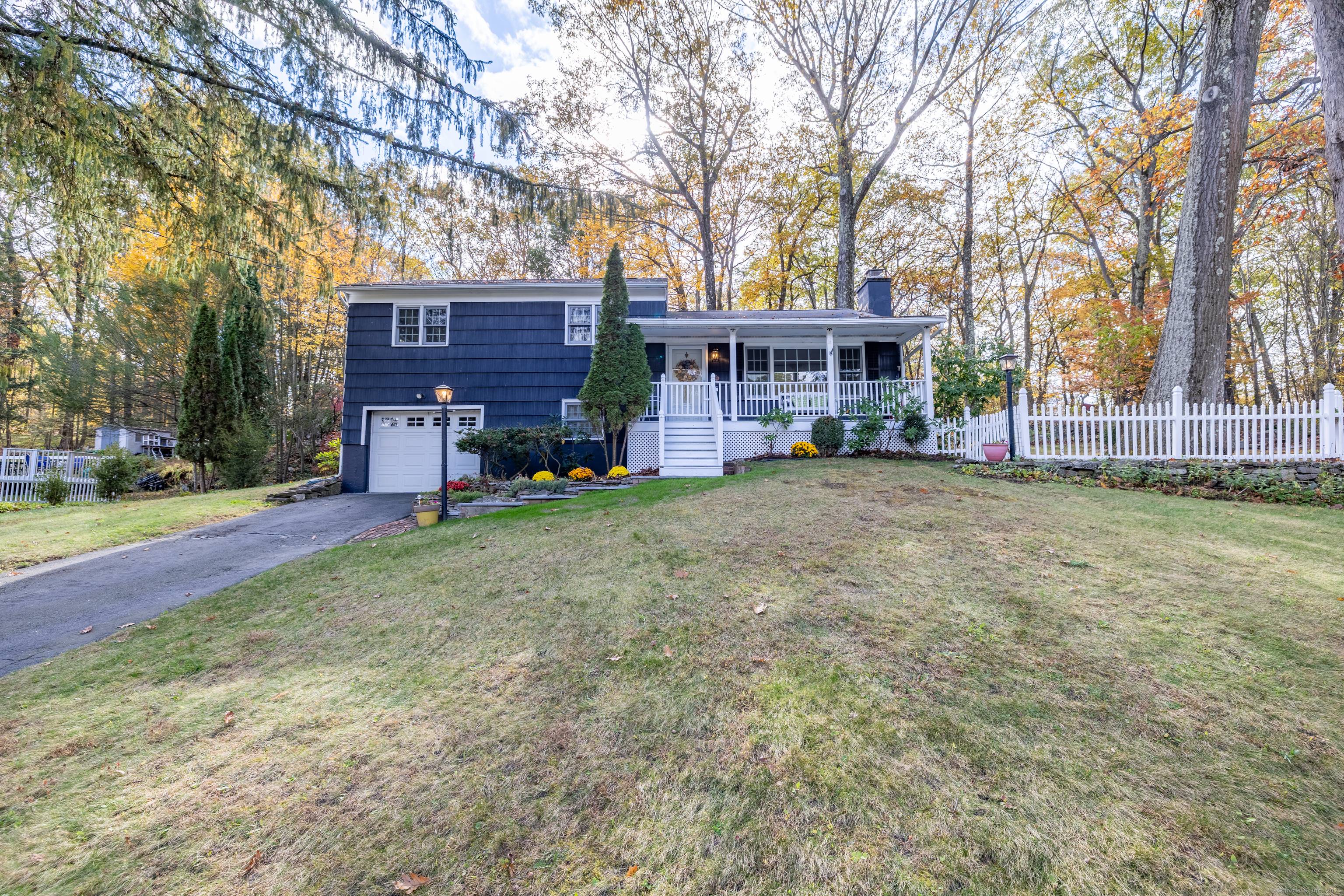 Welcome to 32 Dana Road in Danbury's desirable Pembroke neighborhood !