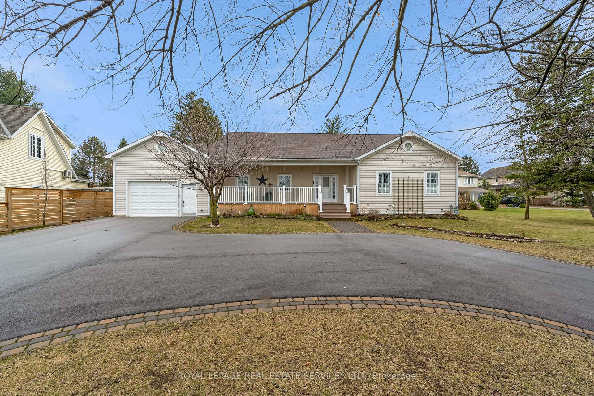 Nestled in an idyllic setting amidst picturesque vineyards, this exquisite 3 3 bedroom 2 family home offers unparalleled exclusivity in Niagara on the Lake.