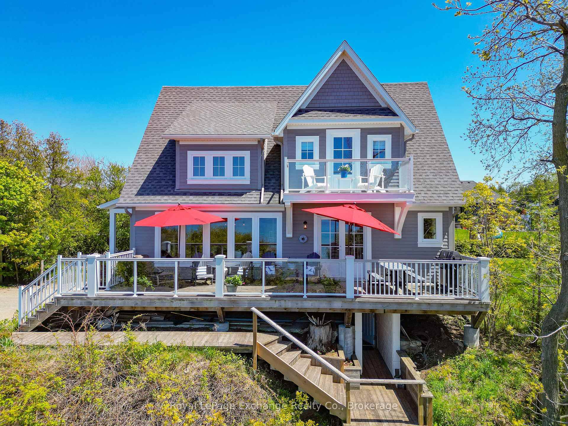 Stunning Lake House with unmatched sunset over Lake Huron's Boiler Beach Experience the beauty of this modern, meticulously crafted home, built 4 years ago to high performance building standards.