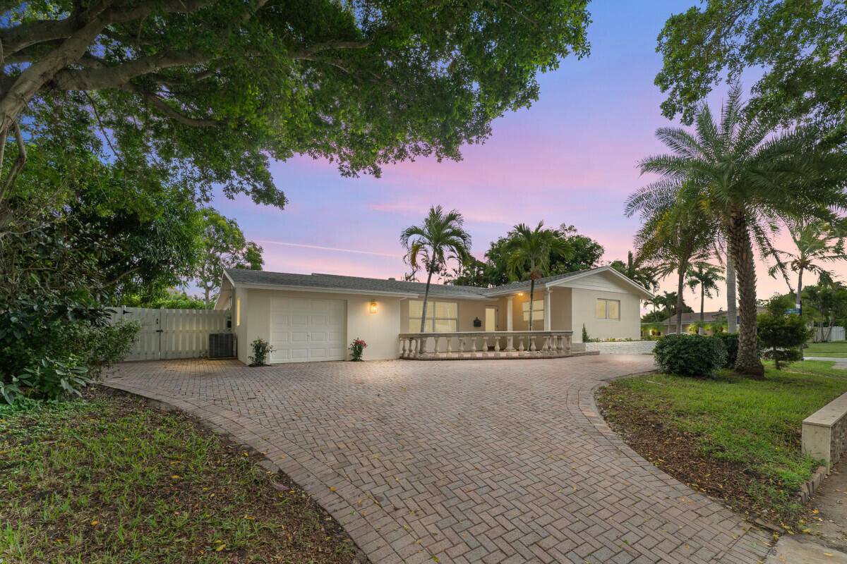 Welcome to your dream home in the highly sought after neighborhood of North Palm Beach, where coastal charm meets contemporary elegance.