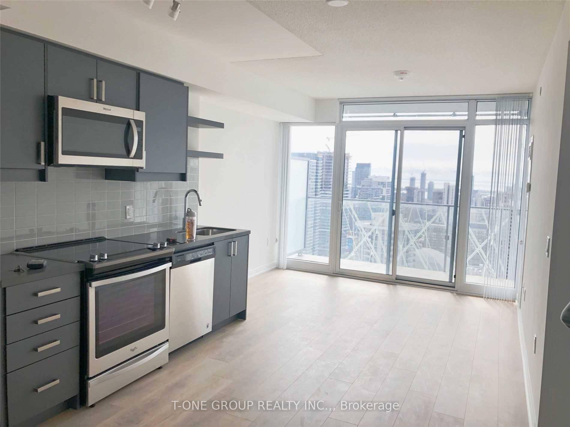 amazing open concept suite features laminate flooring throughout, granite counters, stainless steel appliances and showcases panoramic south facing views from an amazing balcony.