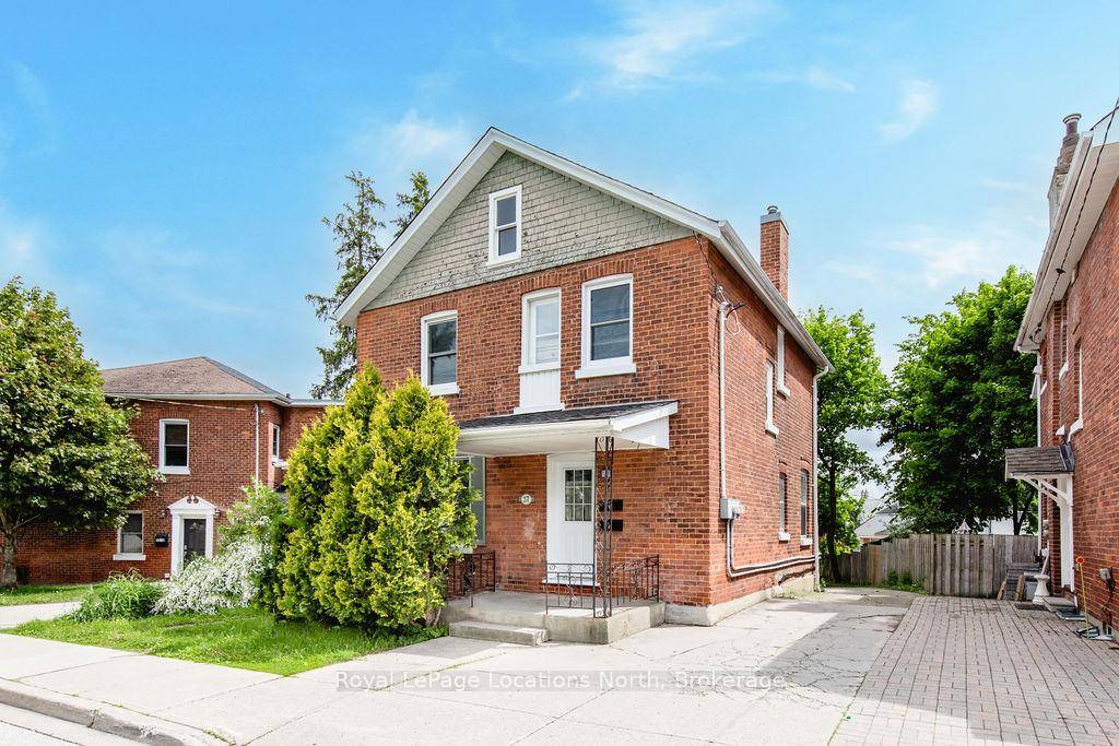 INVESTMENT OPPORTUNITY ! Located in the heart of downtown Barrie, this legal duplex is a prime opportunity for investors or those seeking a comfortable home with income potential.