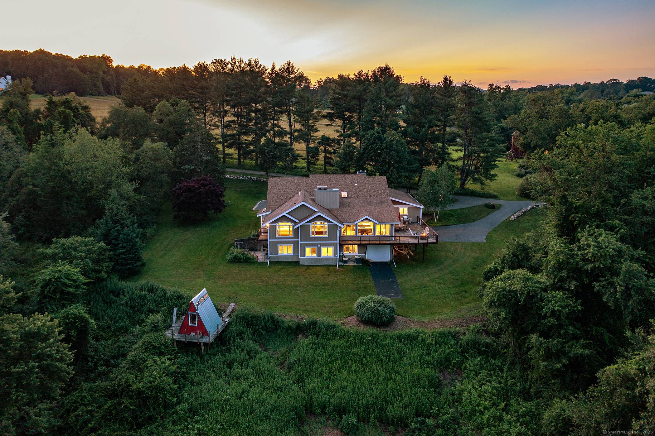 Experience the epitome of modern luxury in this expansive contemporary home with captivating long range southerly VIEWS !