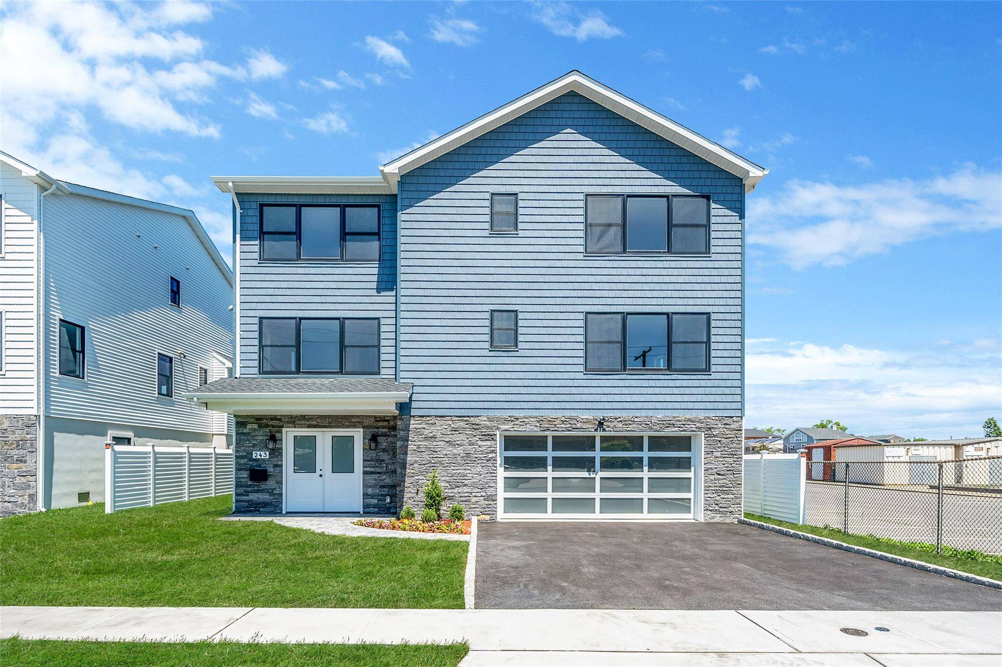 WELCOME TO 243 MOTT ST, A 2025 NEW CONSTRUCTION HOME THAT IS BUILT ON A 7, 528 SQ FT LOT 55X140.
