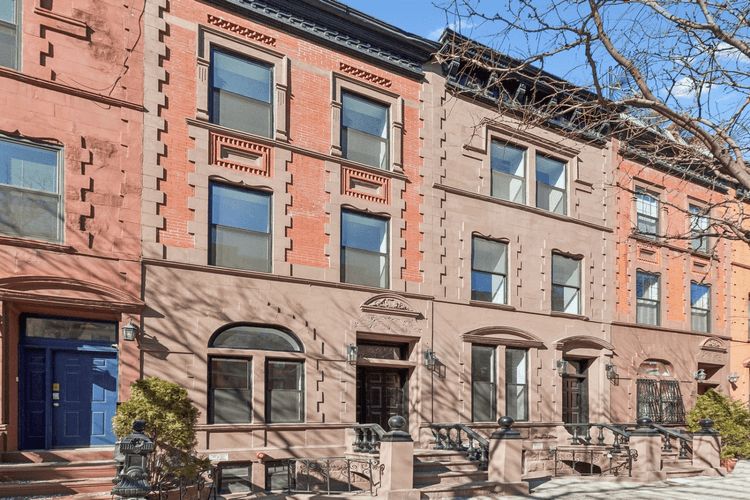 This elegantly reimagined South Harlem brownstone seamlessly blends historic charm with modern sophistication.