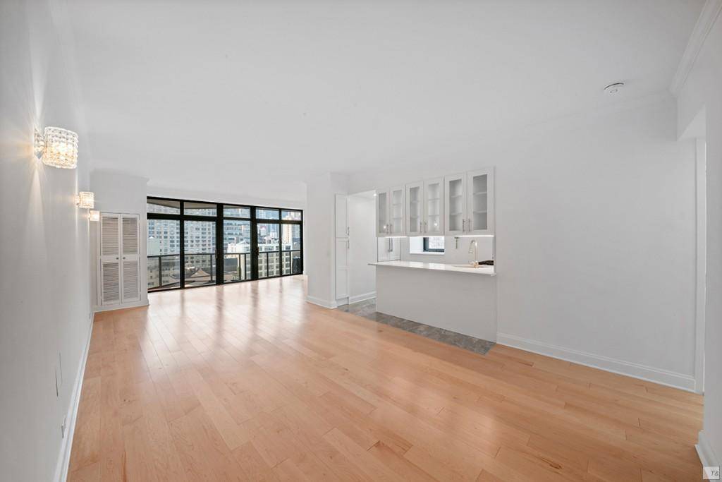 Renovated beautiful 4 bedroom home with dining area just on market for sale at 100 United Nations Plaza, One of Midtowns premier white glove buildings.
