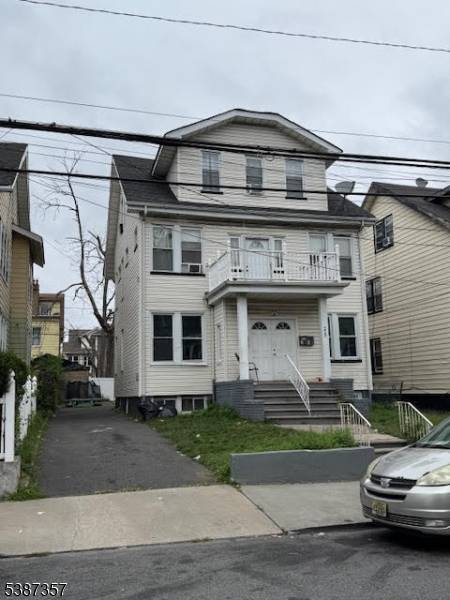 Legal 3 fam with driveway, great condition, all separate utilities, perfect for investors or first time homebuyers, great area close to major highways and public transportation, shops etc.