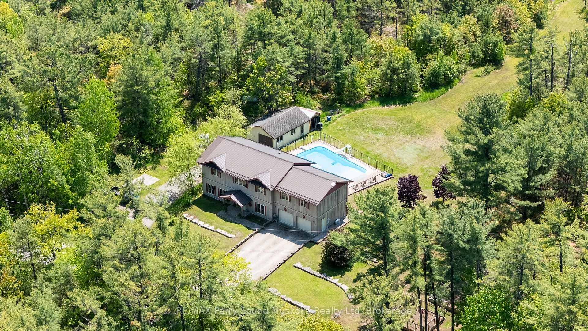 Beautiful cottage country family home, abutting crown land and steps away from Georgian Bay.
