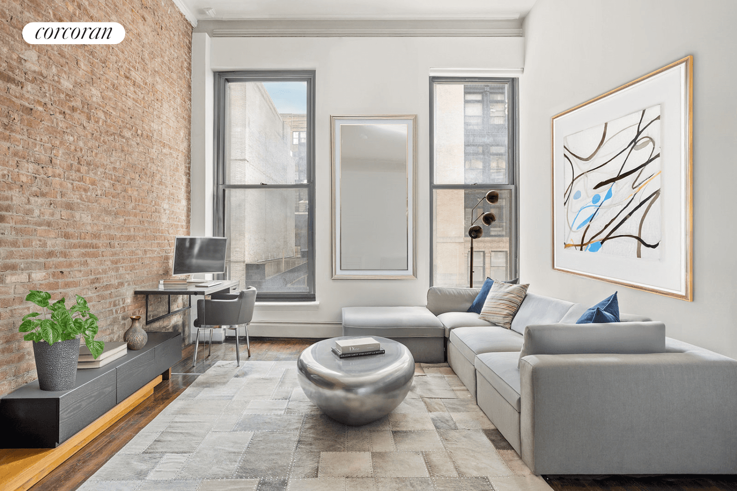 NEW PRICE C403 is the pre war loft of your dreams with soaring 14 foot ceilings and exposed brick on the border of Greenwich Village and Noho.