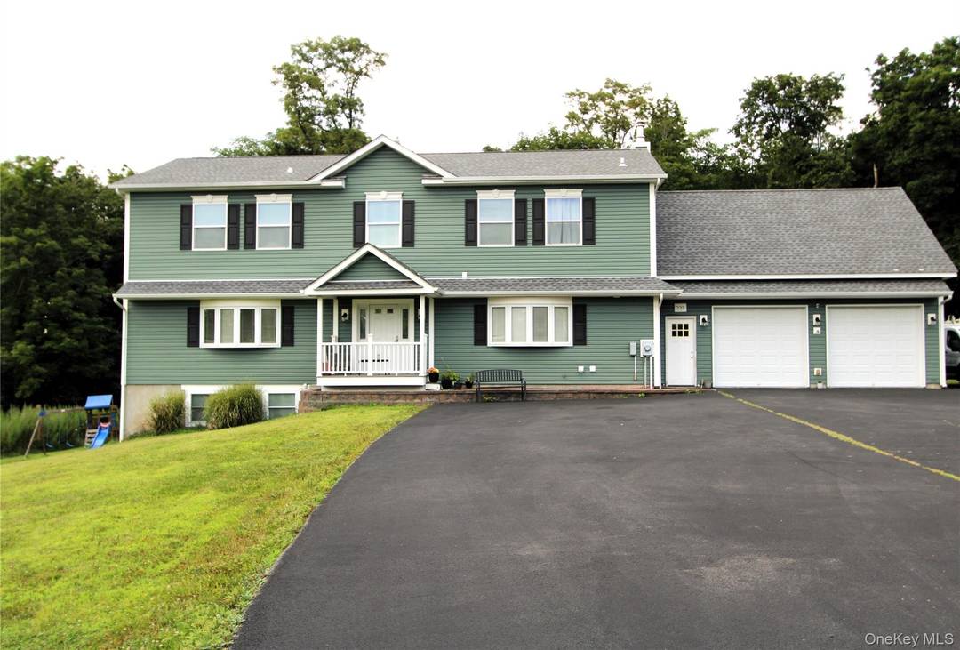 Experience the ultimate blend of tranquility and convenience in this stunningly renovated colonial, perfectly situated at the end of a quiet, dead end road.