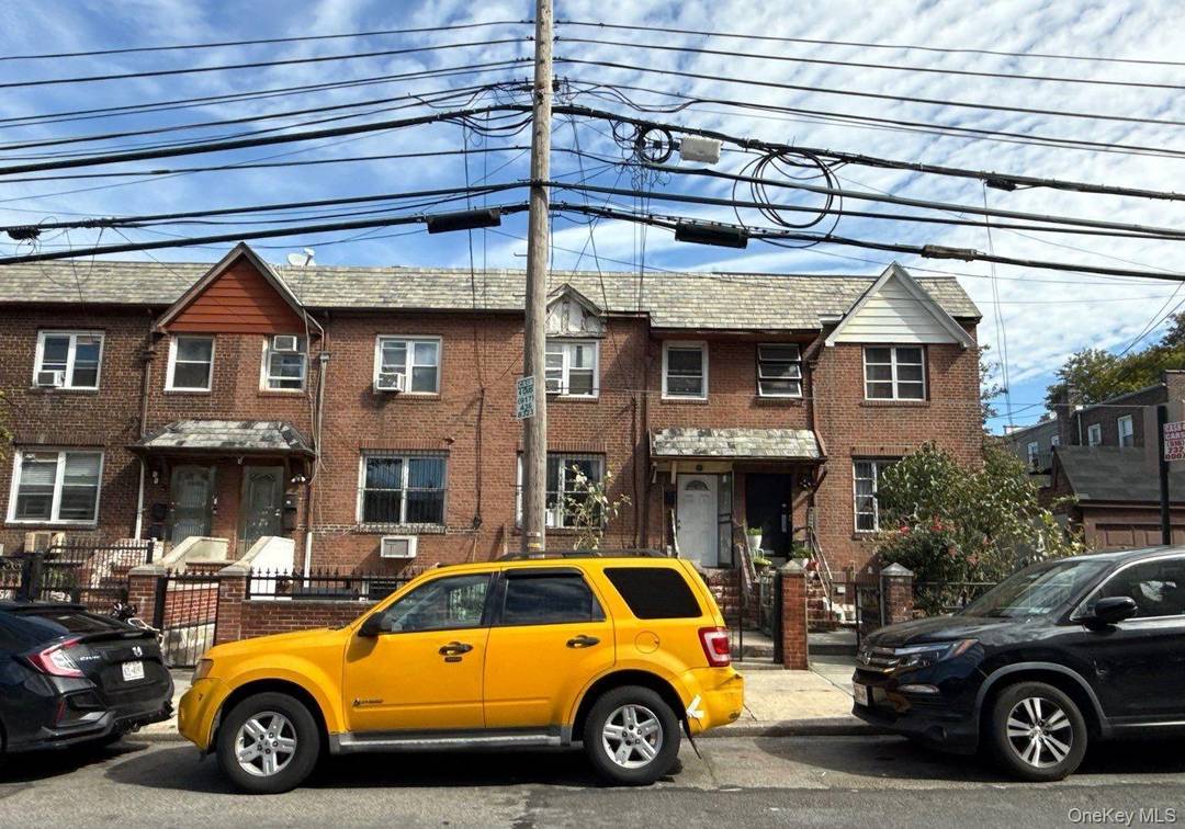 This duplex style home features three bedrooms, two full baths, an eat in kitchen, and a one car garage.