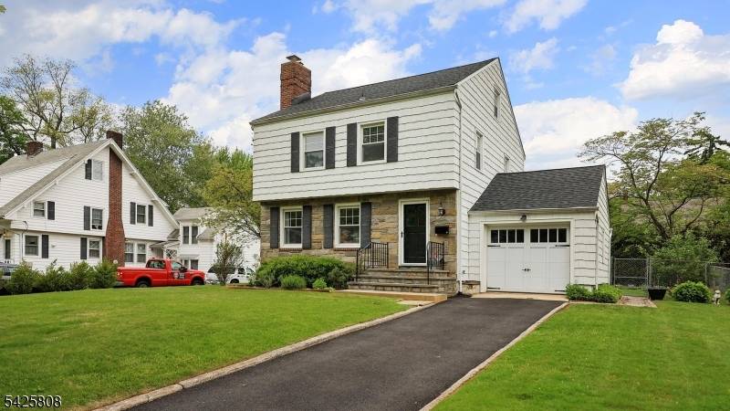 Set on a charming tree lined street in one of Cranford's most convenient neighborhoods, this delightful Colonial blends timeless character with warmth, charm, and everyday comfort.