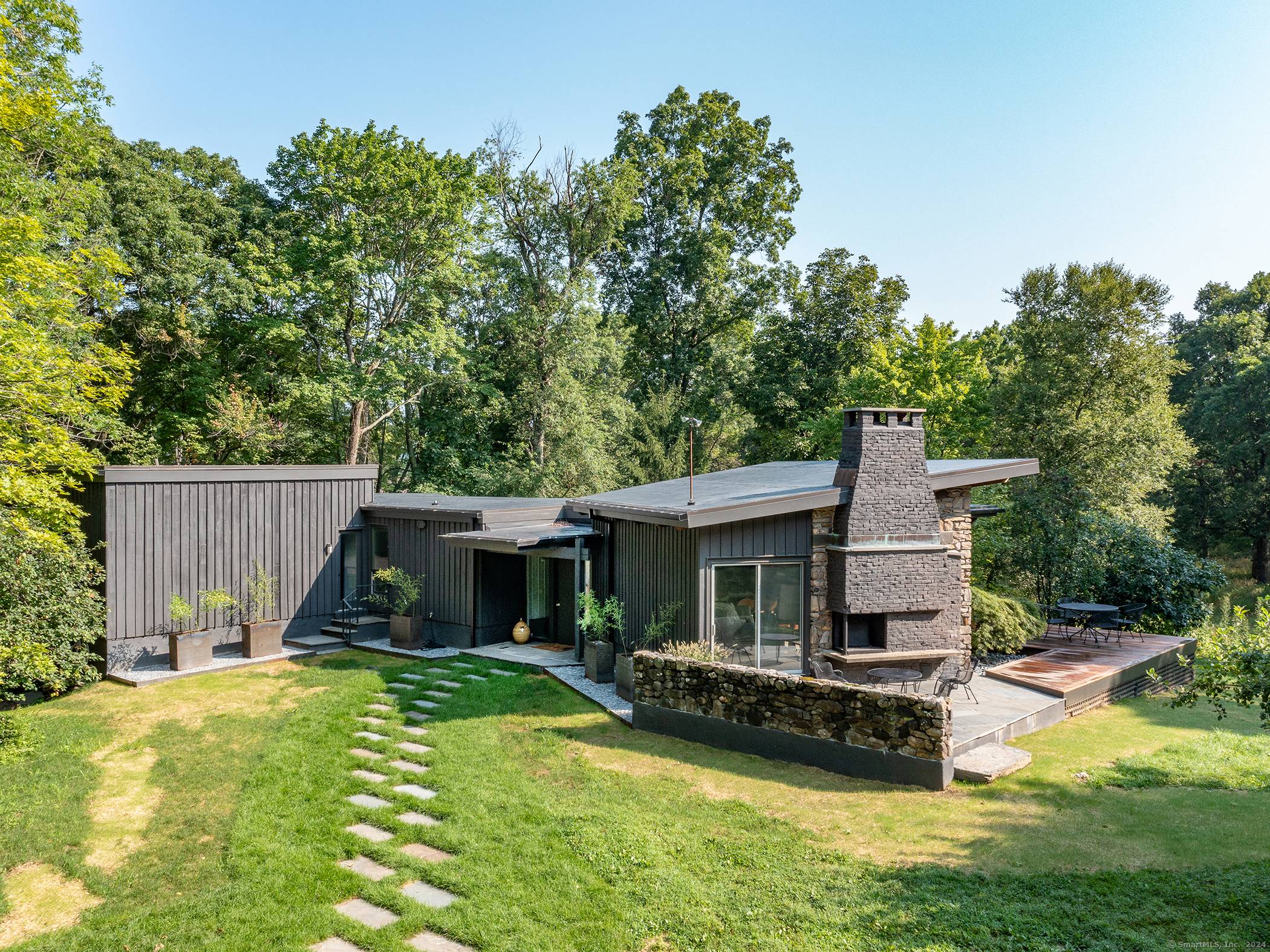 Super chic mid century overlooking the Johnson Farm Preserve with hiking trails directly from the house.