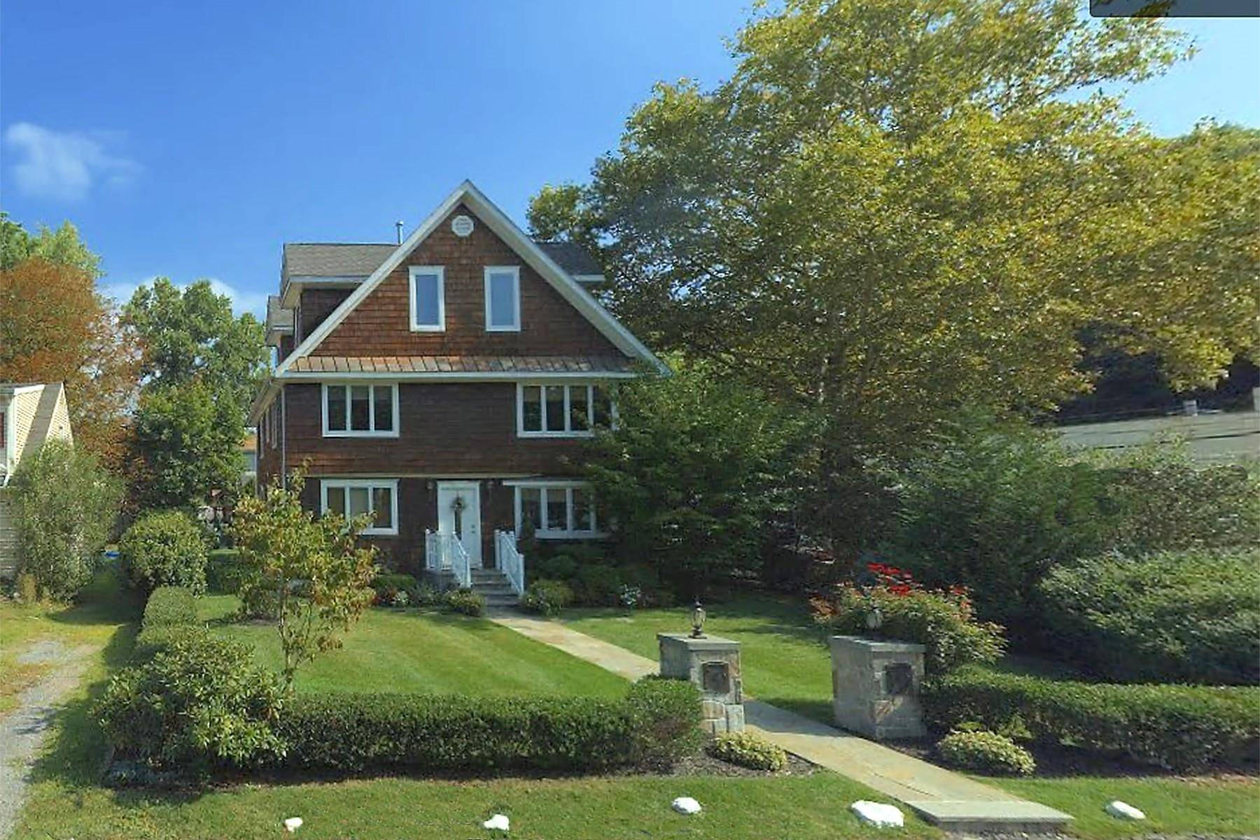 This immaculate Two Family Home with separate garage shows like new !