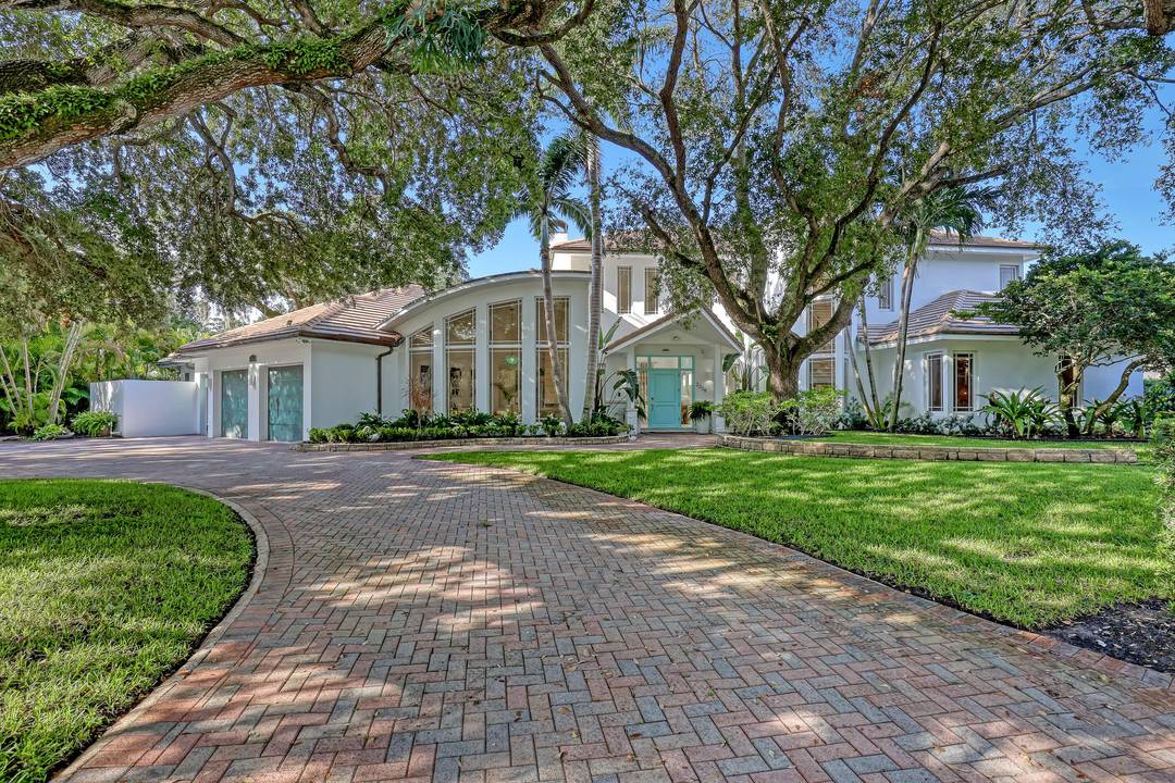 Welcome to 2338 Flamingo Road, a completely remodeled waterfront estate in the heart of Palm Beach Gardens.