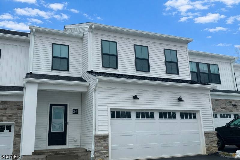 Brand new 2025 Toll Brothers townhome for rent in the highly sought after Oaks at Randolph community.
