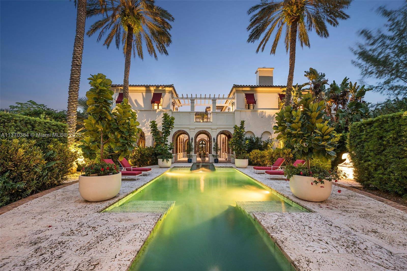 Experience unparalleled luxury at this magnificent 2 acre peninsula estate within the exclusive gated community of Journey's End.