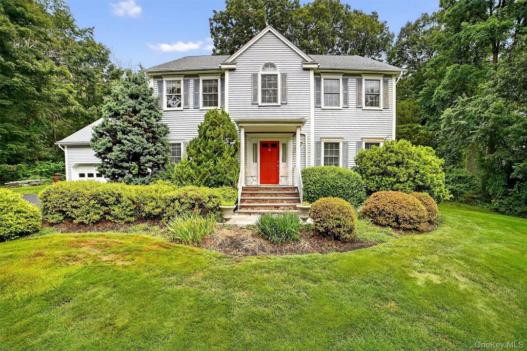 Timeless Colonial Charm Meets Modern Living This elegant Colonial perfectly balances sophistication and comfort.