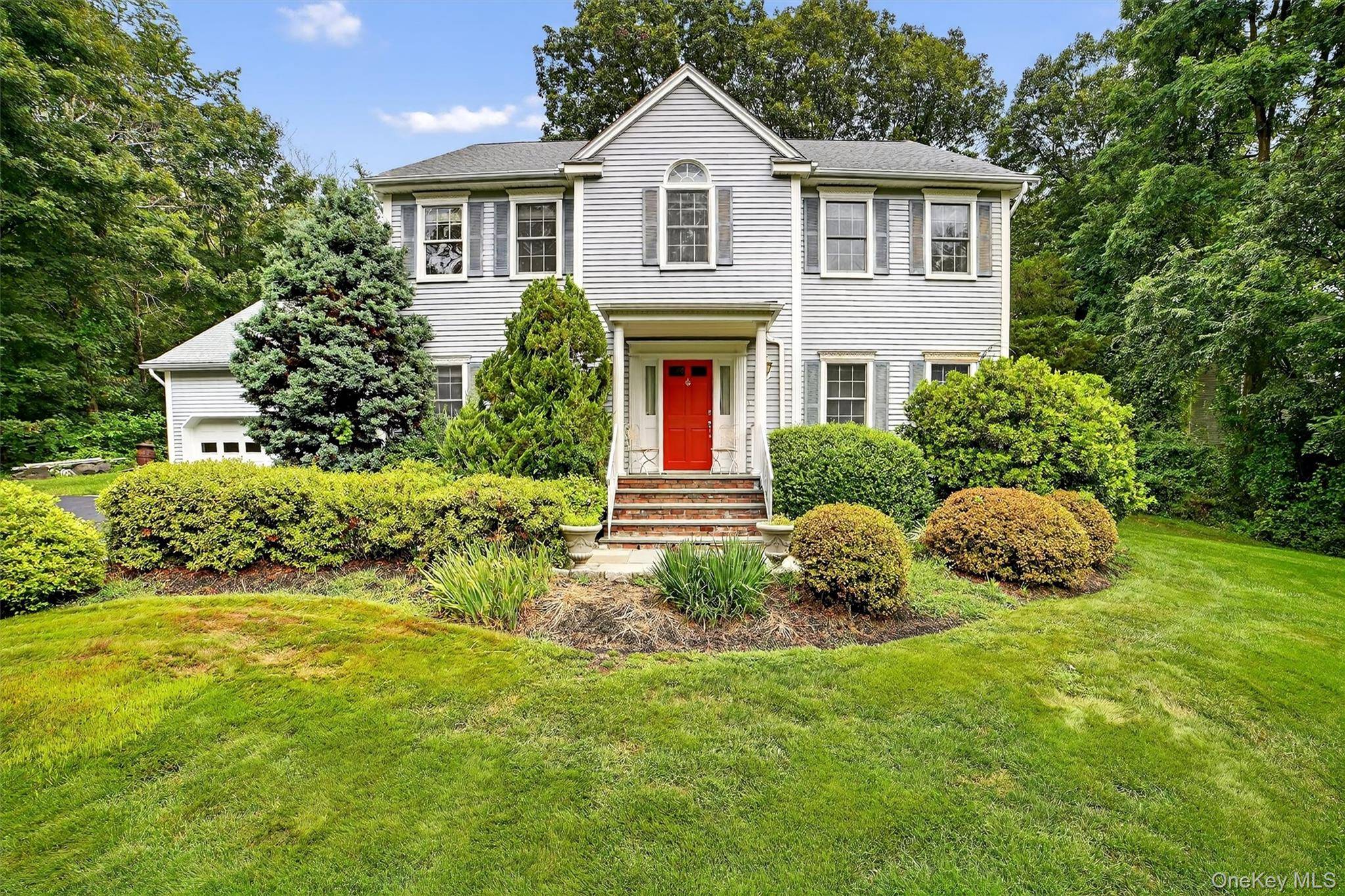 Timeless Colonial Charm Meets Modern Living This elegant Colonial perfectly balances sophistication and comfort.