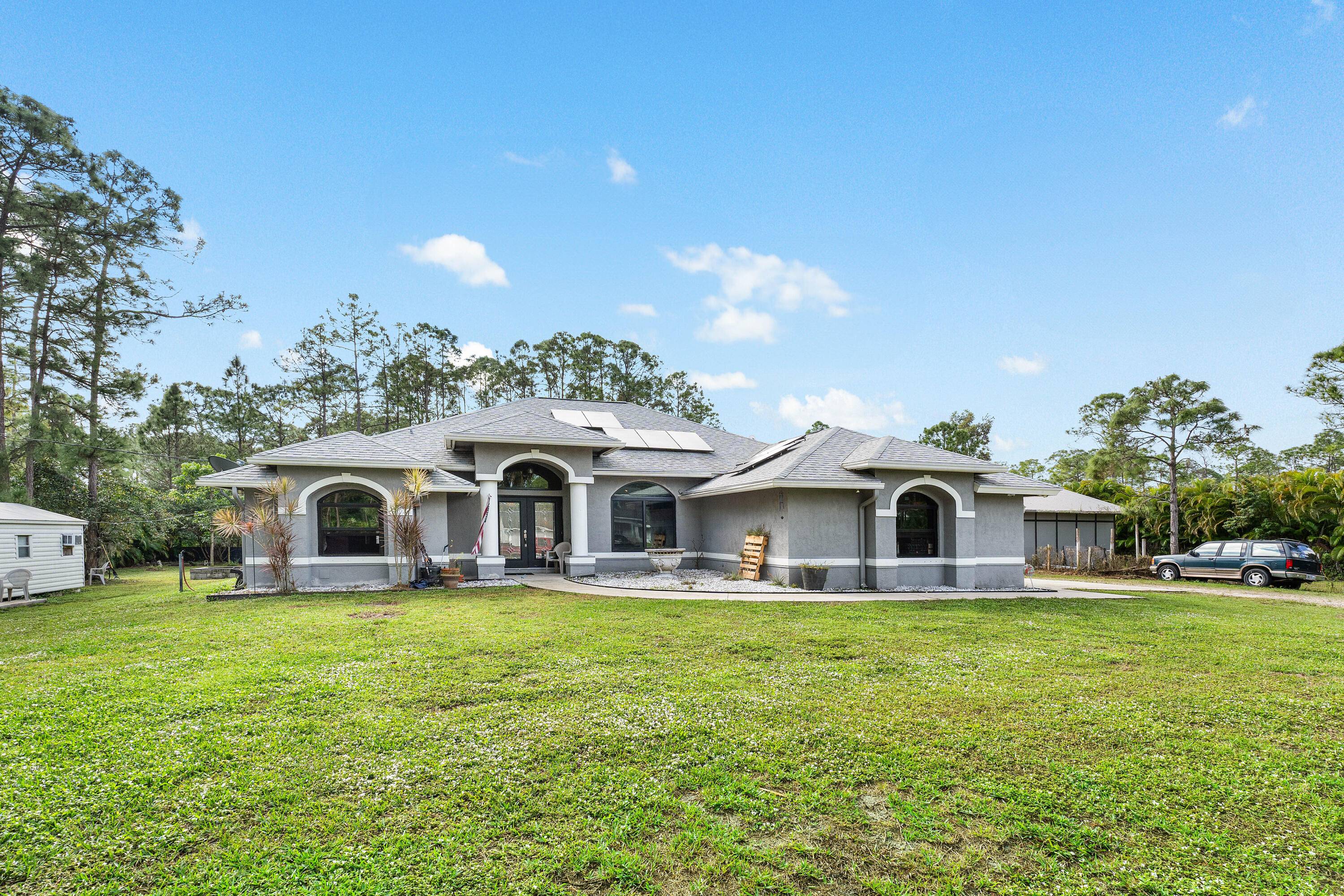 LIVE, WORK, PLAY ! This 4 Bed, 3 bath, 2, 165sqft CBS home offers a perfect blend of comfort and convenience, on an expansive 50, 094 sq ft lot.