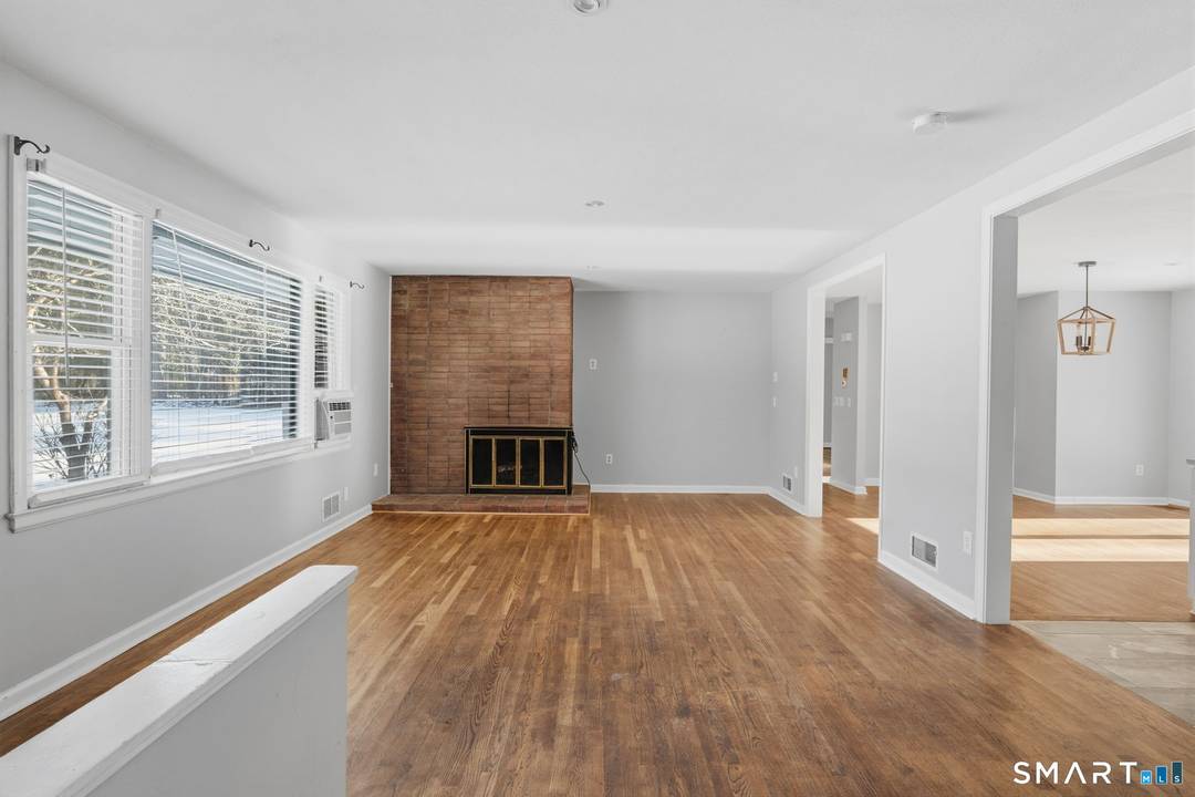 Welcome to this beautifully updated ranch style home set on a serene, one acre lot in Avon.