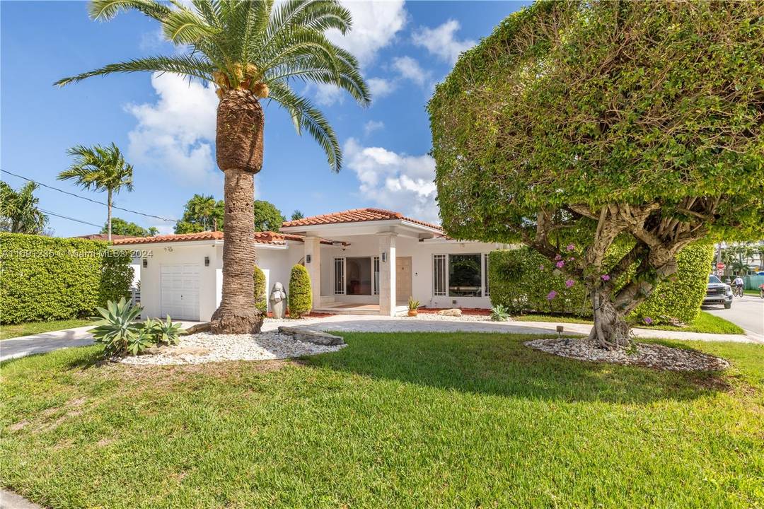 Exceptional corner home in Surfside, located just in front of multi million dollar waterfront estates and within walking distance to the beach.