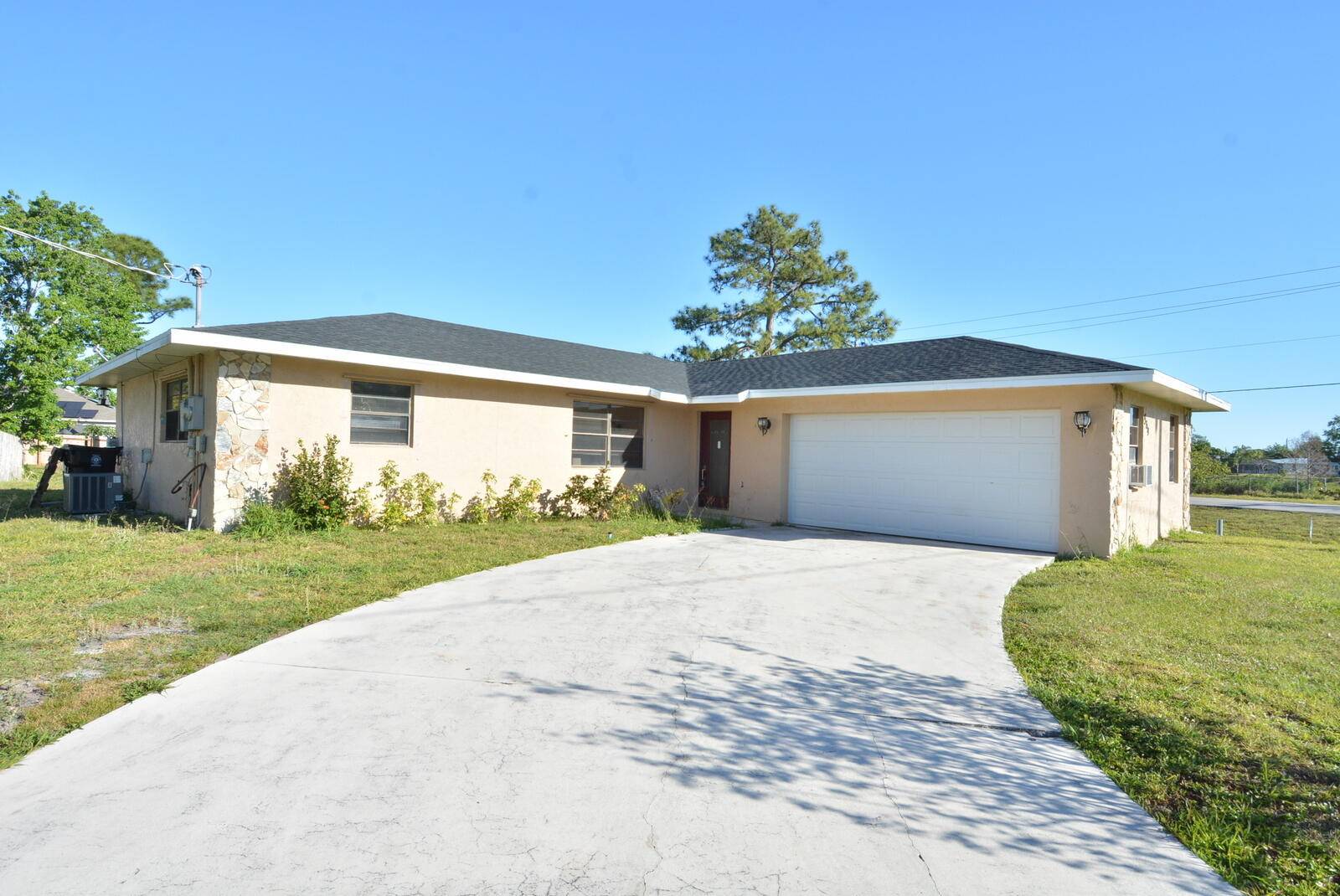 Step inside this spacious 3 2 2 CBS home with NEW 2025 ROOF situated on an oversized corner lot !