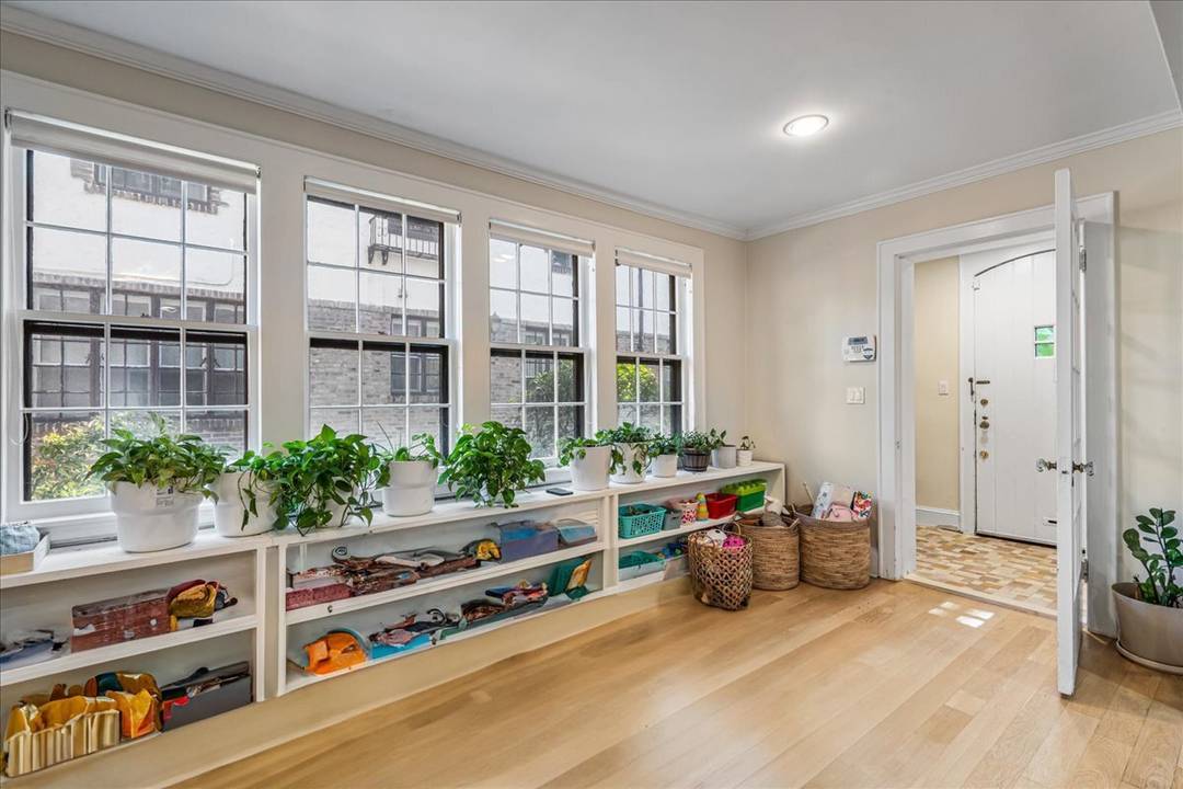 Tudor style home set in the prestigious enclave of Forest Hills Gardens, this 5 bedroom, 3.