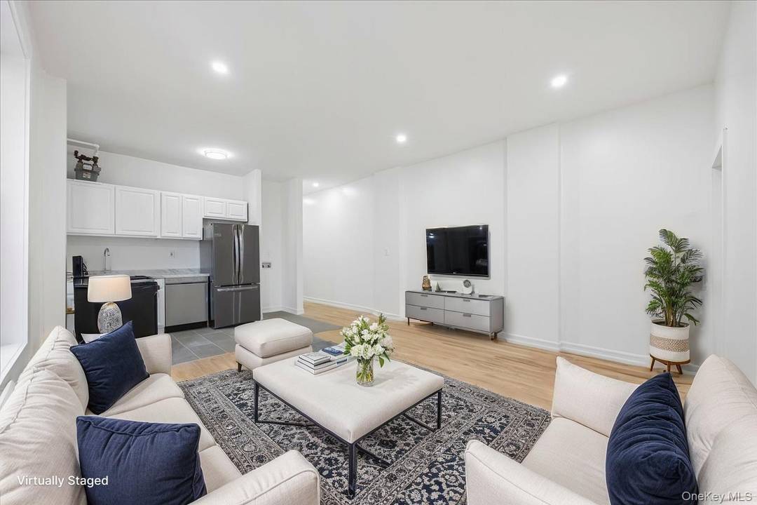 Welcome to 160 Wadsworth Ave Apt 302, a stunning 792 square foot condominium that perfectly blends modern comfort with elegant design.