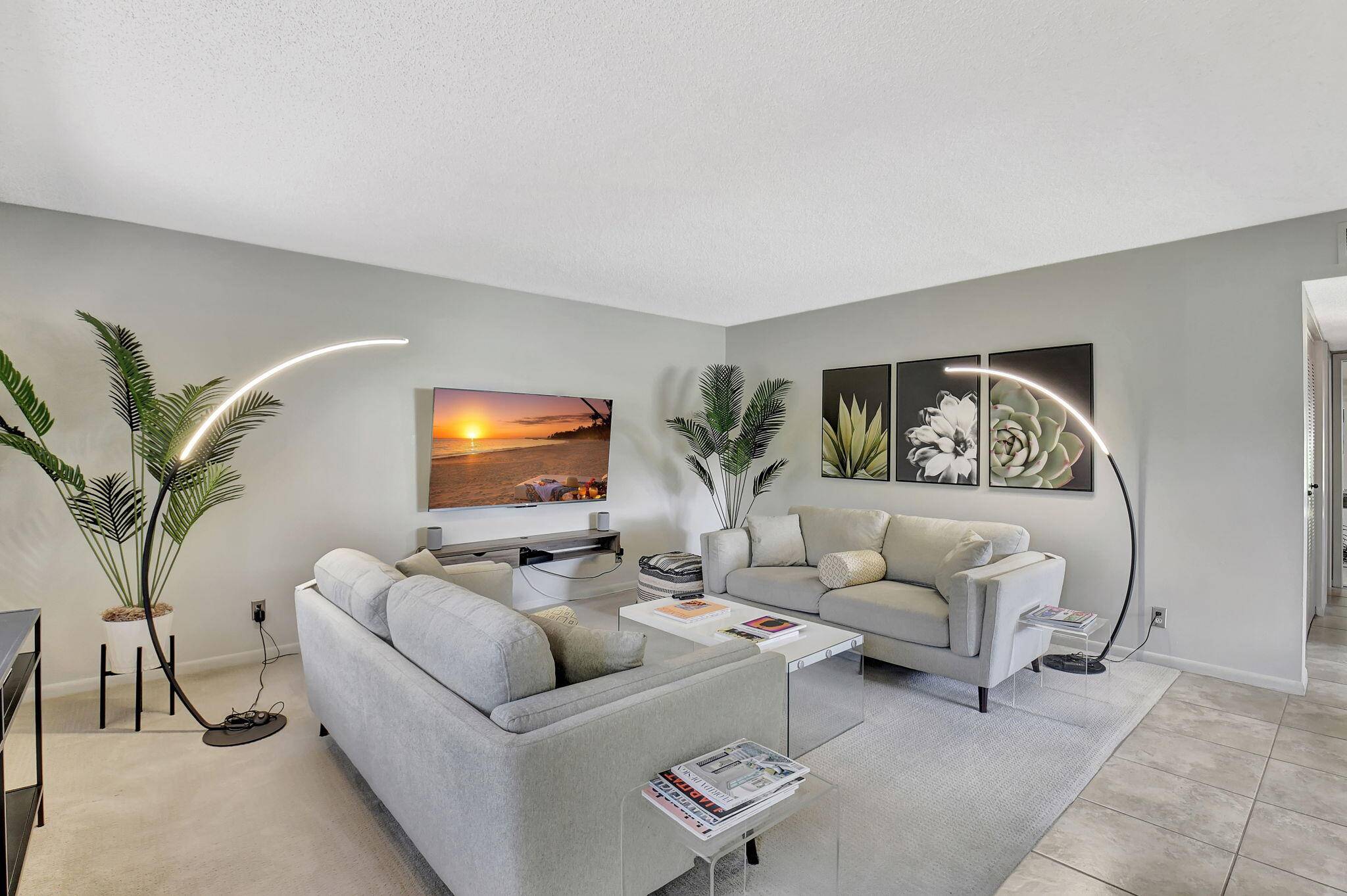 Welcome to this Beautifully Decorated, Turnkey 2 Bedroom, 2 bath 1st floor end unit condo.