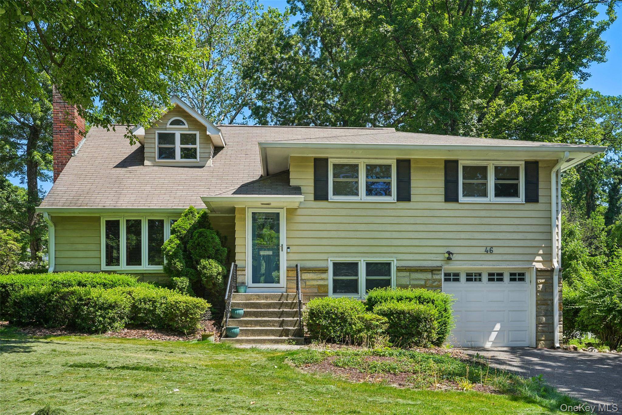 Welcome to this spacious and inviting 4 bedroom, 2 bath split level home that truly has it all !