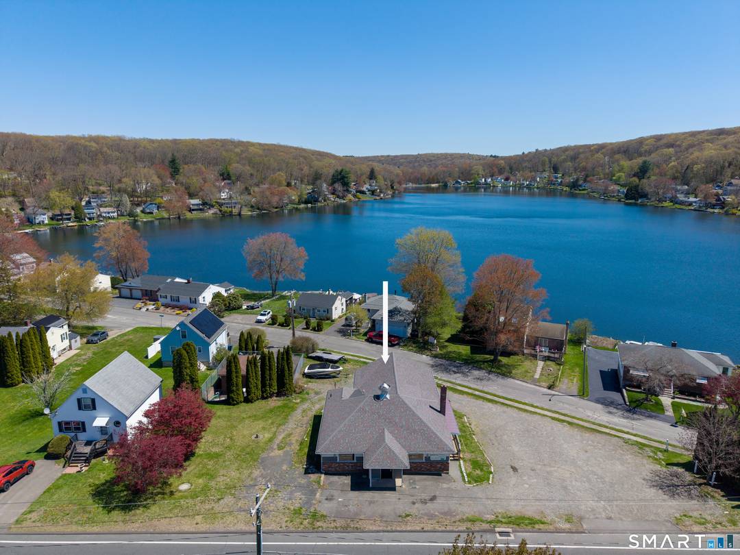Exceptional opportunity at 305 South Street in Plymouth, CT directly across from beautiful Plymouth Lake.