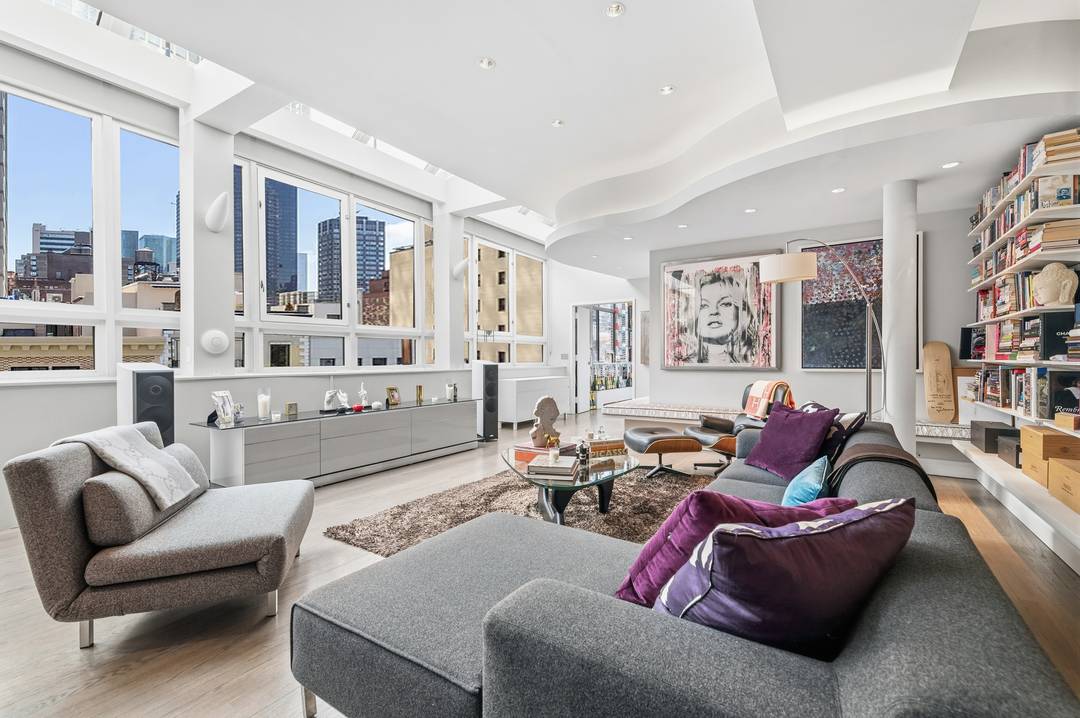 Low monthlies and exceptional scale define this bright, south facing duplex penthouse perched atop a well serviced cooperative in Midtown East.