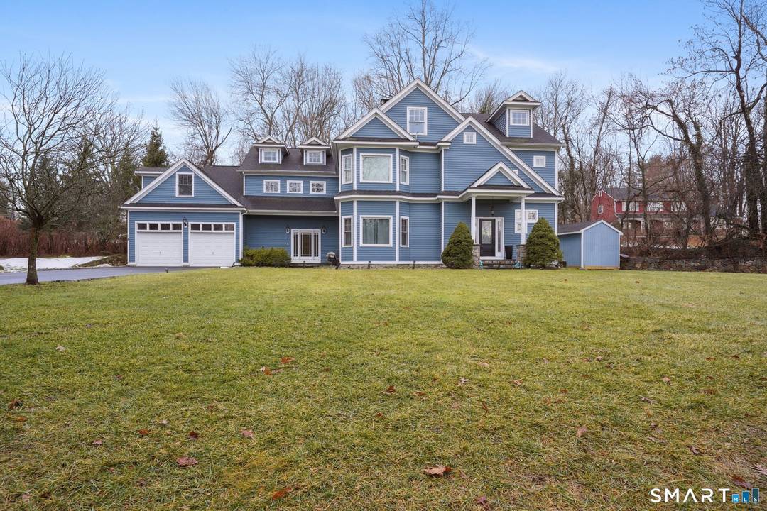 Welcome to this stunning West Norwalk Colonial offering exceptional space, comfort, and versatility across four finished levels.