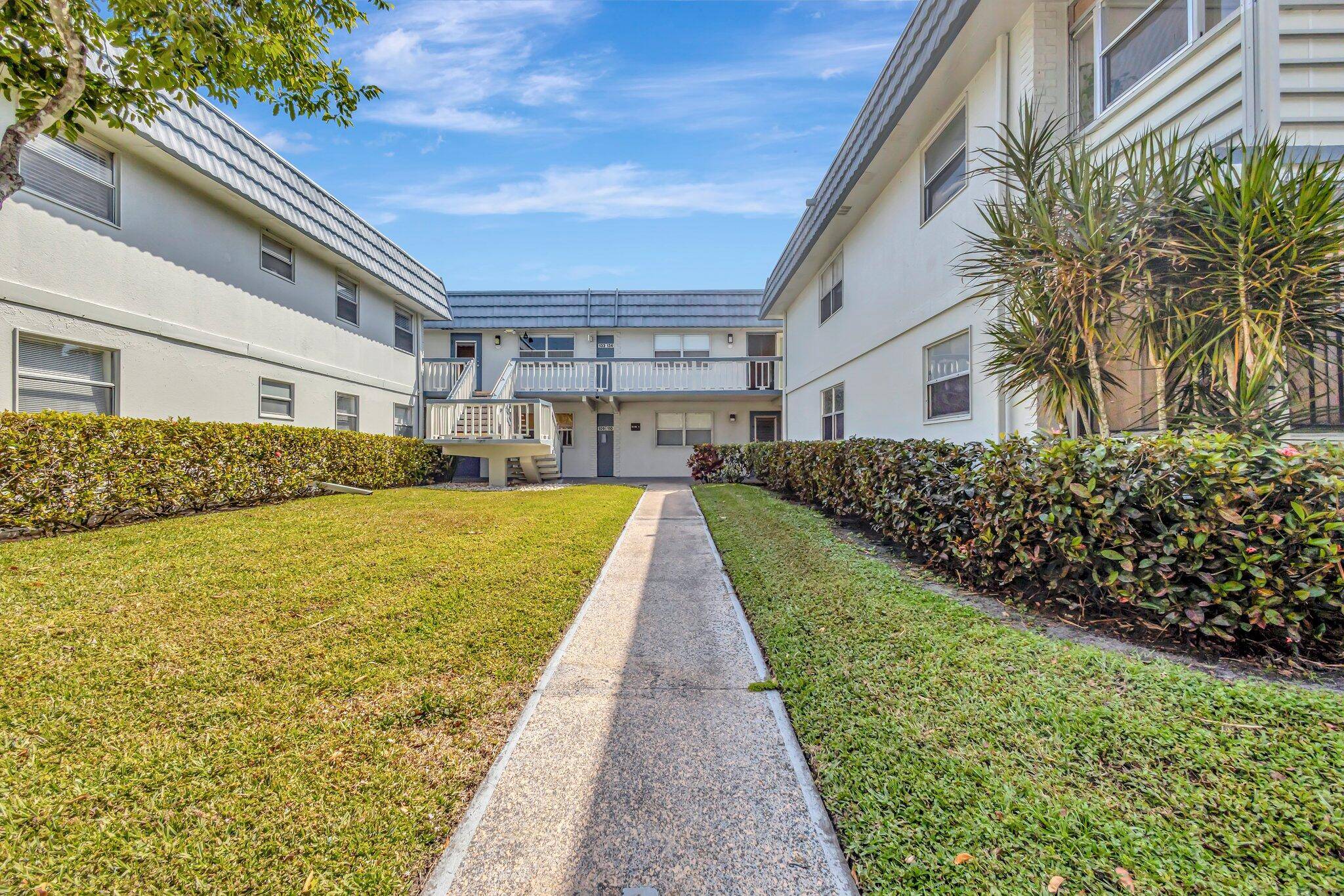 TOTALLY UPGRADED AND IMMACULATE 2 2 SECOND FLOOR, FURNISHED 'FLORIDA CONDO' OPEN KITCHEN WITH ISLAND, GRANITE, STAINLESS APPLIANCES.