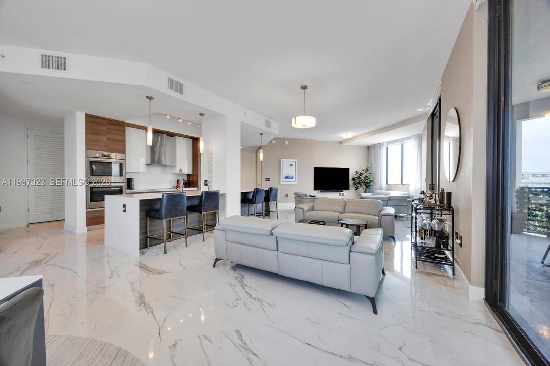 The largest residence in Merrick Manor, this impressive LPH corner unit offers 4 bedrooms and 4 baths with a thoughtfully designed split floor plan.