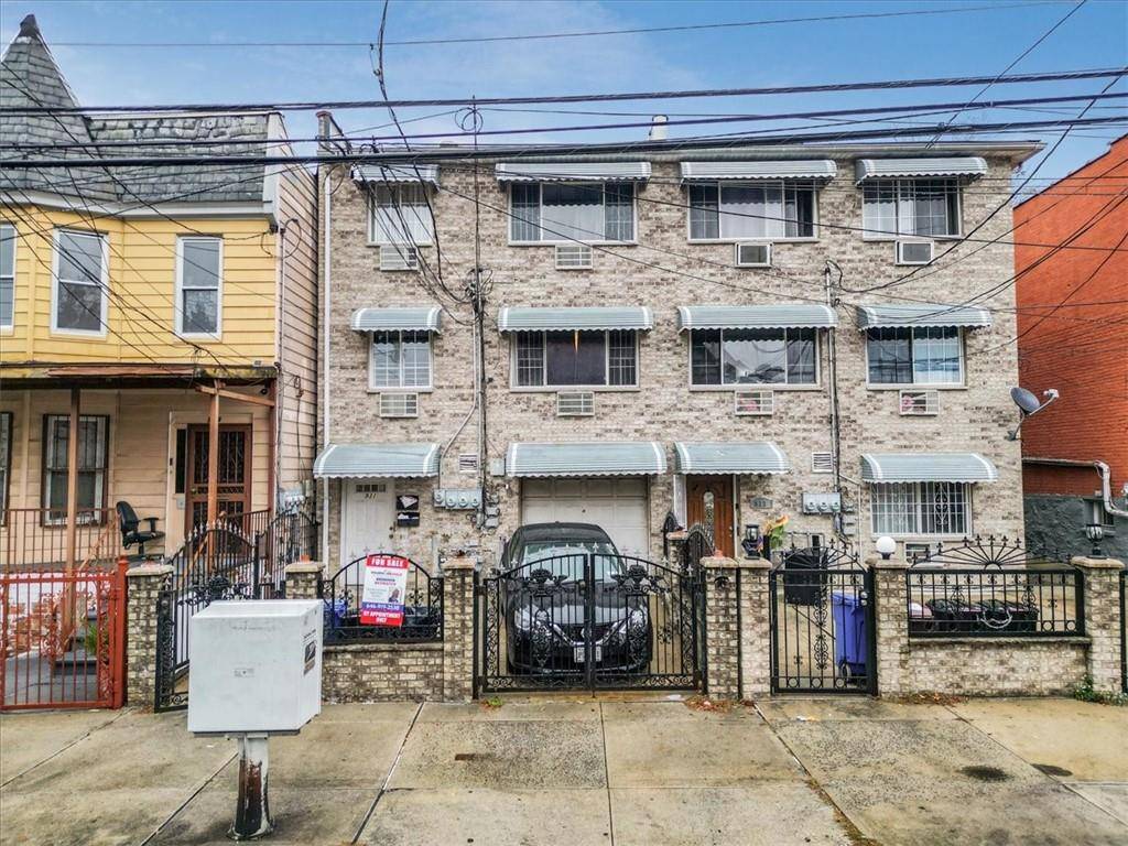 This exquisite three family home is a rare find in a peaceful, friendly neighborhood.