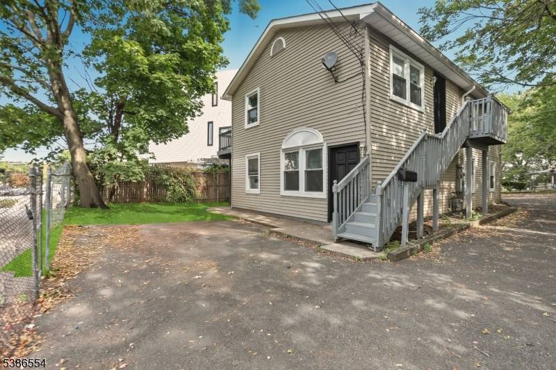 Welcome to 102 Oxford Street, a beautifully renovated two family home in Paterson offering both comfort and investment potential.