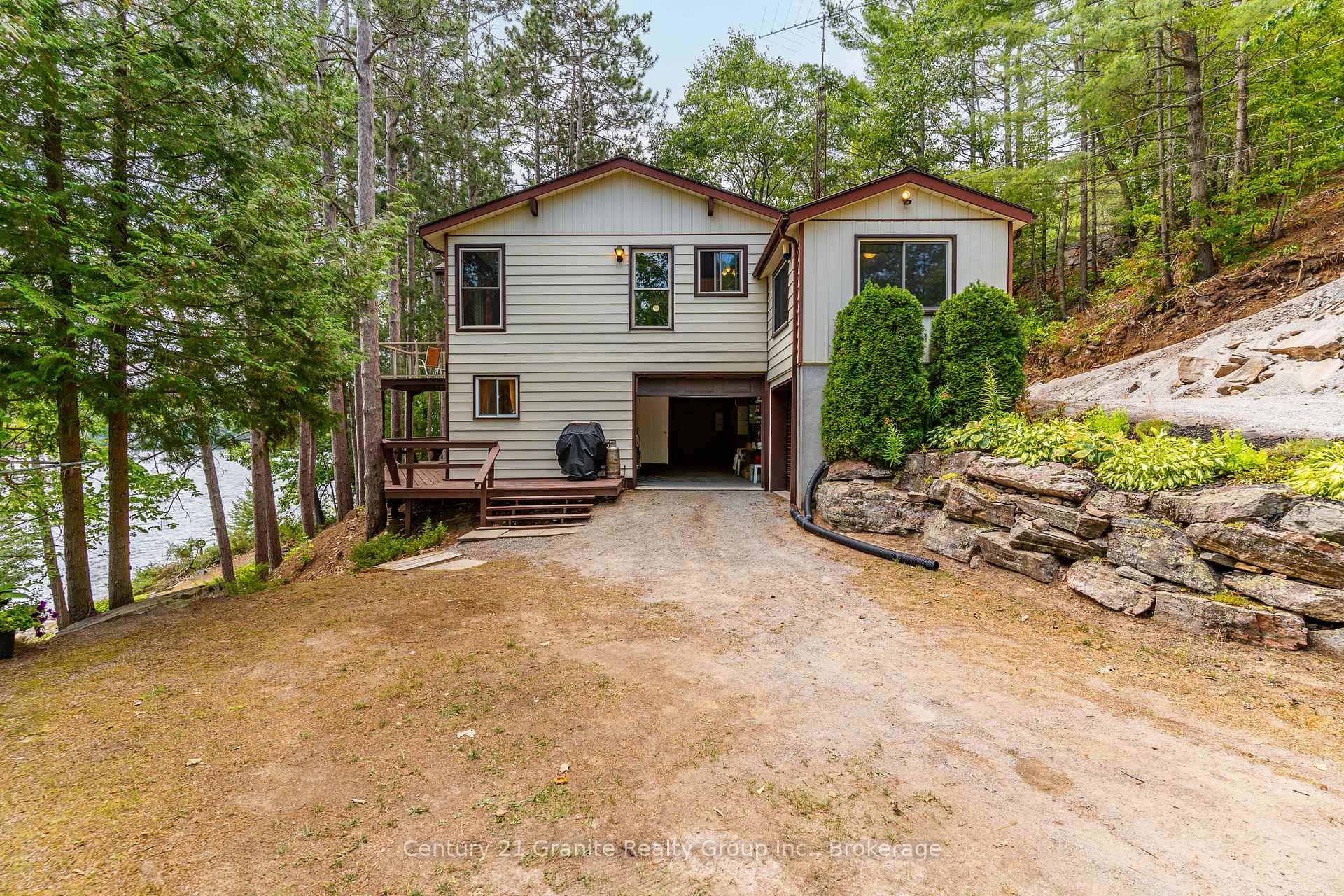 Escape to your own slice of paradise on sought after Gull Lake.