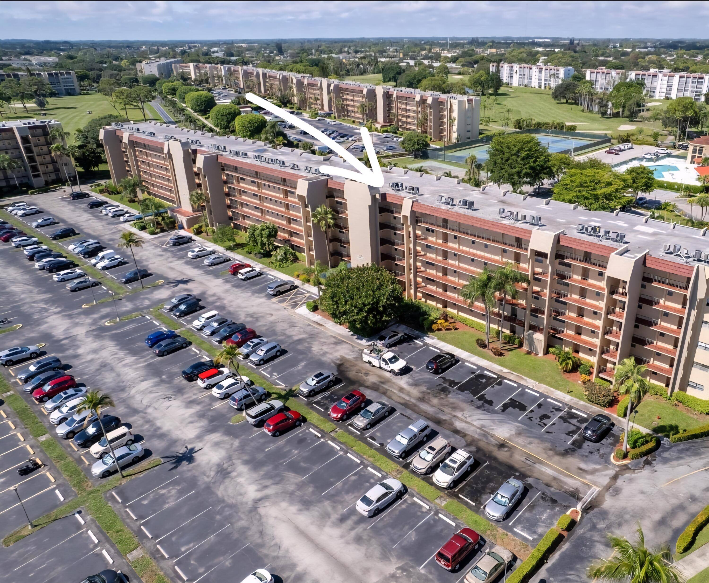 Wake up to gorgeous sunrise skies and wind down with glowing sunset views from this top floor condo in Poinciana Place, a 55 active adult community.