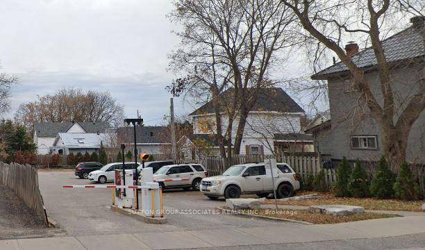 Prime Investment Opportunity Parking Lot amp ; Rental Property in Orillia.